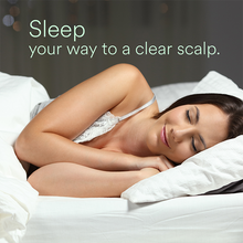 Load image into Gallery viewer, Woman peacefully sleeping on white bed with text “Sleep your way to a clear scalp.”
