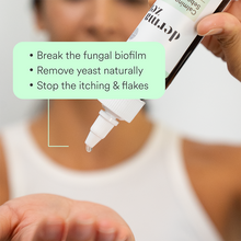 Load image into Gallery viewer, Hand holding a bottle of Dermazen Calming Seborrheic Serum with text “Break the fungal biofilm, remove yeast naturally, stop the itching &amp; flakes.”
